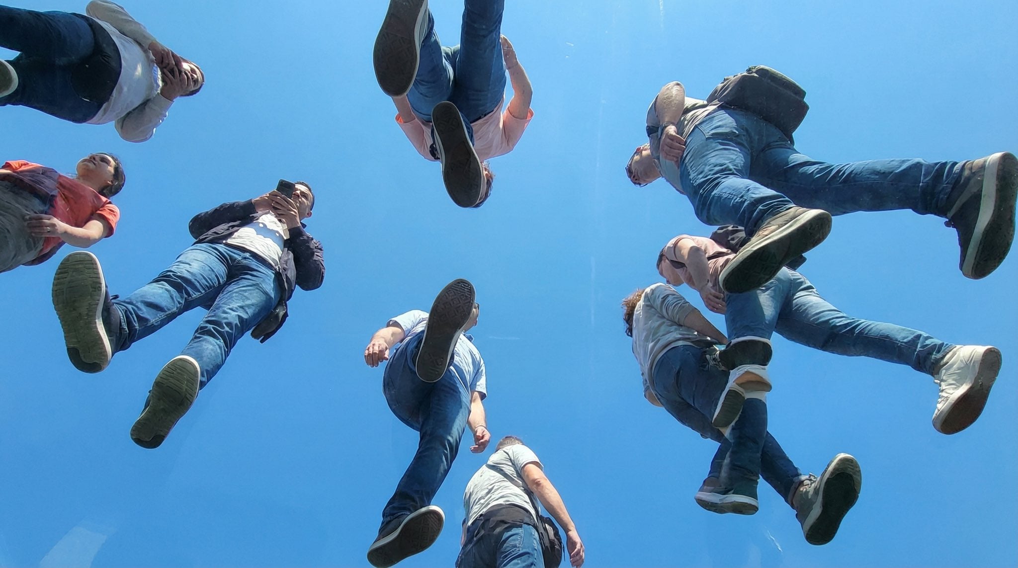 Underfoot Plexiglass Sky Background with Walking People(4)