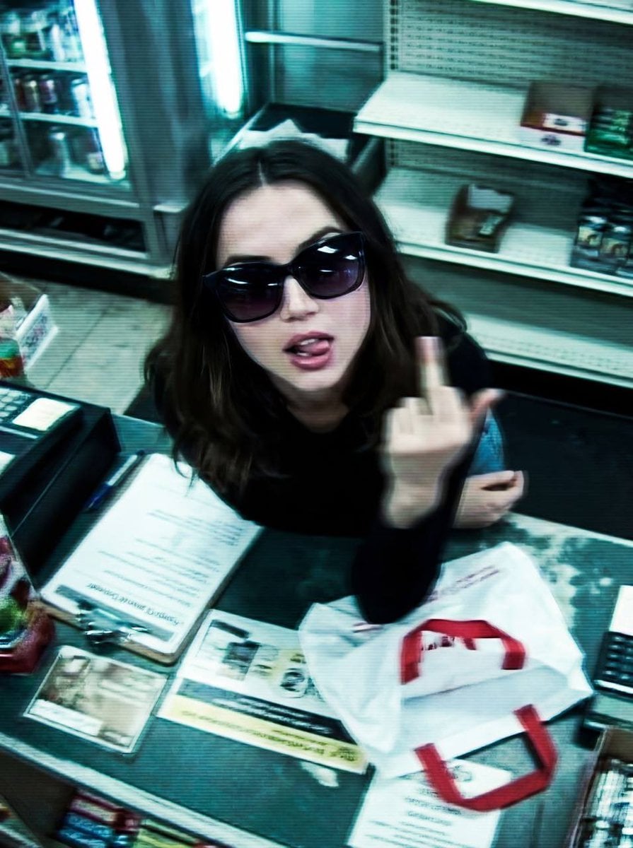 Defiant CCTV Portrait in a Cluttered Retail Shop(2)