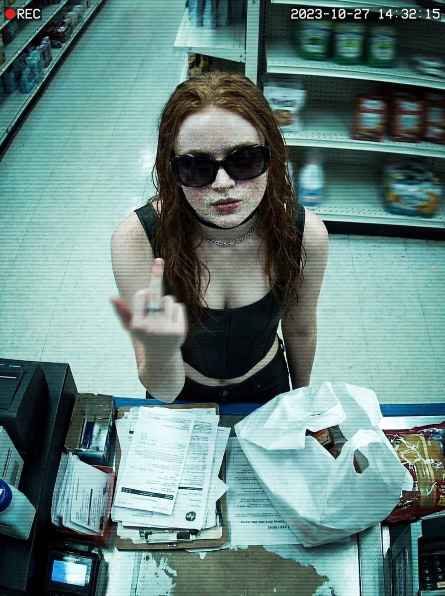 Defiant CCTV Portrait in a Cluttered Retail Shop(3)