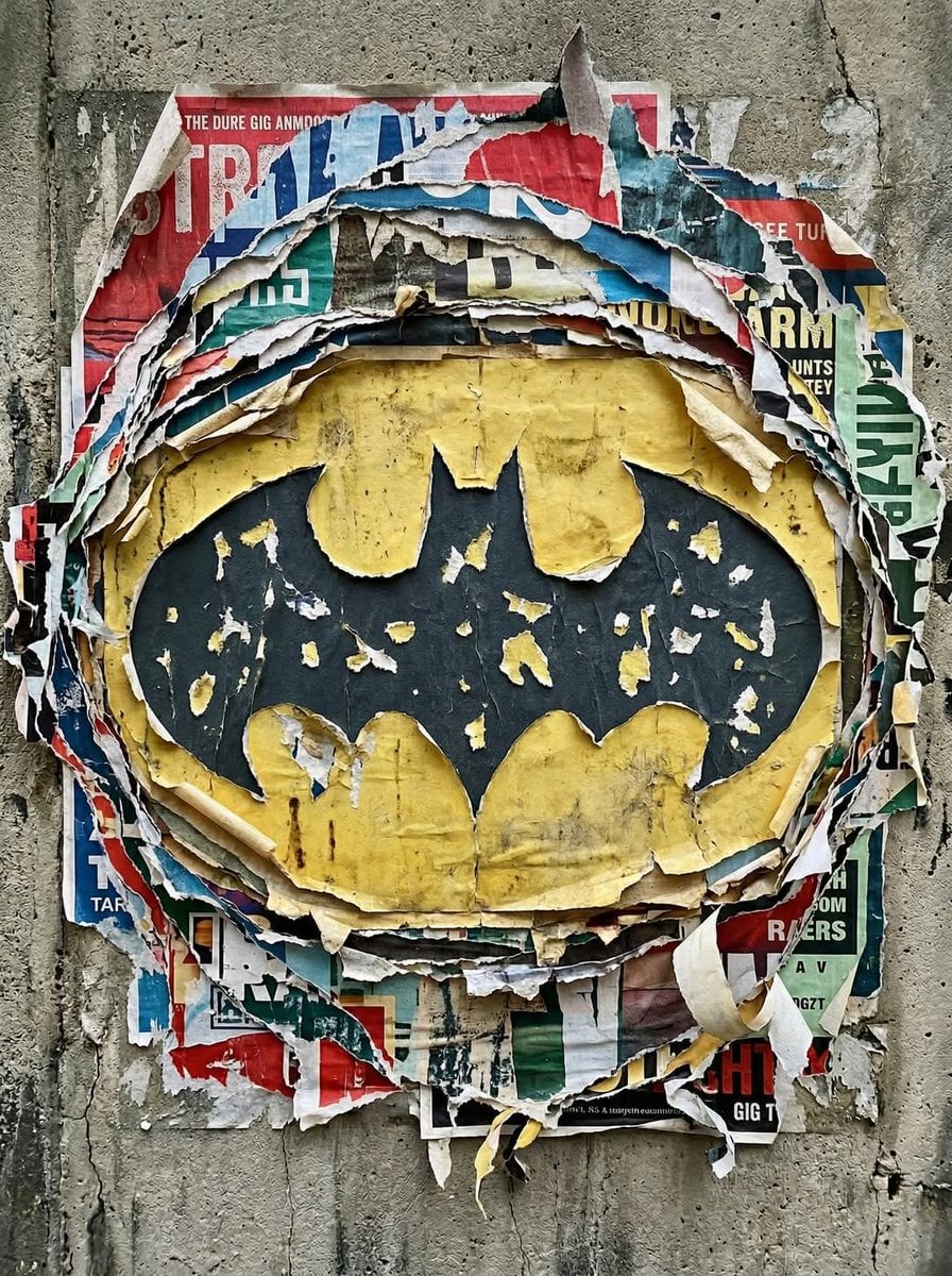 Torn Poster Logo on a Weathered Urban Wall(4)